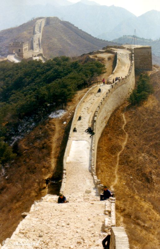 The Great Wall at Badaling. The section of the wall at Badaling was the first large section to be restored. It serves as the foremost spot to see and walk on the Wall. This popularity is also due to its proximity to the Ming graves and the short distance from Beijing. This picture shows that there remains considerable reconstruction work to be done even here. China - Badaling