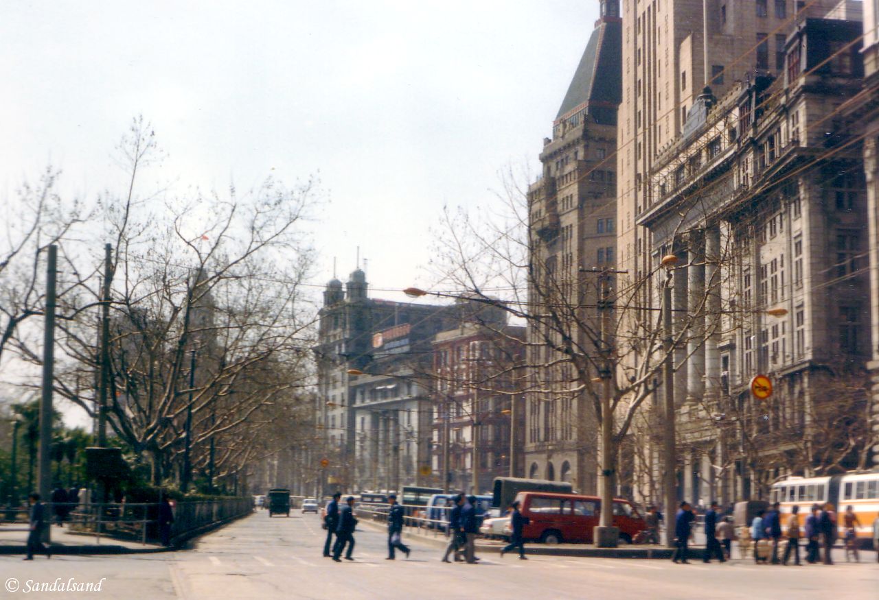 The Bund in Shanghai. Street numbers and name of buildings from right to left on this picture: #24 Yokohama Specie Bank Building #23 Bank of China Building #20 Sassoon House, part of the Peace Hotel. #19 Palace Hotel, part of the Peace Hotel. #18 Chartered Bank Building #17 North China Daily News Building China - Shanghai - The Bund