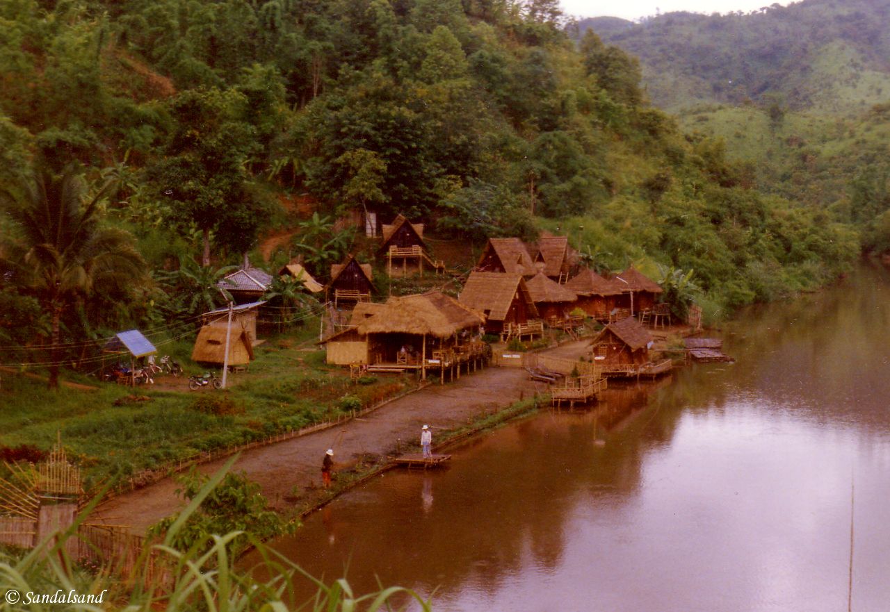 Thailand - Bungalows on the Mae Sai River. Burma is across the river Thailand - Mae Sai