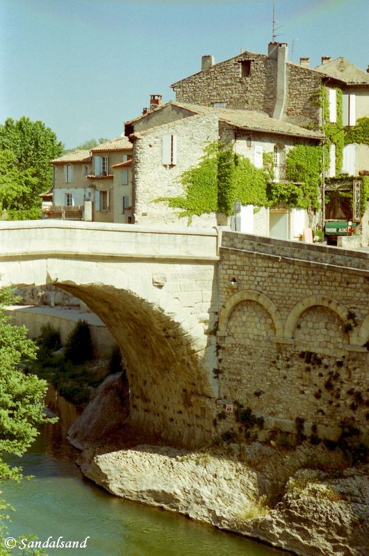 France - Provence - Vaison-la-Romaine - Ancient Roman bridge across the River Ouvèz France - Provence - Vaison-la-Romaine - Ancient Roman bridge across the River Ouvèz