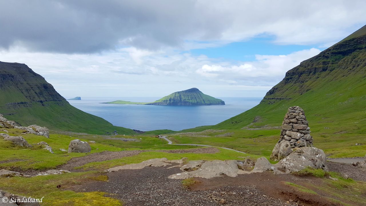 Panoramic view from Oyggjarvegur on Streymoy with the island of Koltur in the distance